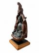 Buddha Menla brons op hout